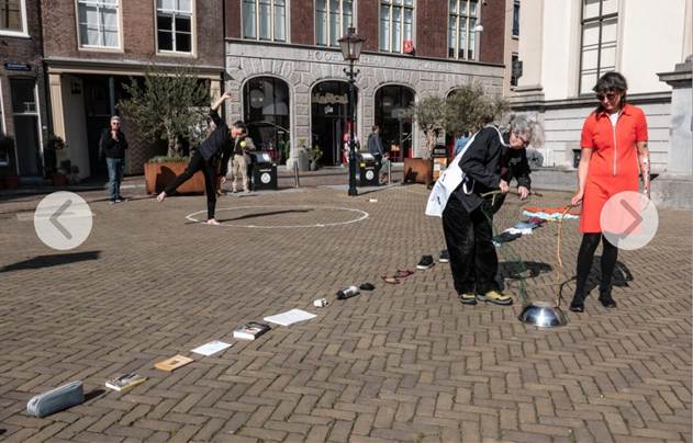 Afbeelding met buitenshuis, kleding, schoeisel, gebouw
Door AI gegenereerde inhoud is mogelijk onjuist.